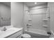 Clean bathroom with a bathtub and shower combination, a vanity, and modern fixtures at 1112 Oak Meadow Dr., Conway, SC 29526