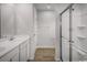 Well-lit bathroom with a glass-enclosed shower, modern fixtures, and a vanity at 1112 Oak Meadow Dr., Conway, SC 29526