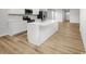 Elegant kitchen island featuring quartz countertops and a stainless steel sink at 1112 Oak Meadow Dr., Conway, SC 29526