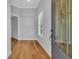 Inviting foyer with hardwood floors, neutral walls, and a decorative glass door at 1309 Suncrest Dr., Myrtle Beach, SC 29577