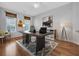 Stylish home office with hardwood floors, ample natural light, and modern decor at 1309 Suncrest Dr., Myrtle Beach, SC 29577