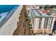 Aerial view of a beachside resort with a pool and easy beach access at 1321 S Ocean Blvd. # 510, North Myrtle Beach, SC 29582