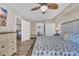 Comfortable bedroom with open entryways to the living room and bathrooms, featuring a spacious layout at 1321 S Ocean Blvd. # 510, North Myrtle Beach, SC 29582