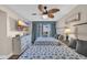 Bright bedroom featuring two beds with coastal-themed bedding and a large flat-screen television at 1321 S Ocean Blvd. # 510, North Myrtle Beach, SC 29582