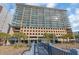 Luxury beachfront building with private balconies, ocean views and palm tree landscaping at 1321 S Ocean Blvd. # 510, North Myrtle Beach, SC 29582