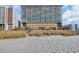 Large beachfront condo building with parking and a boardwalk to the beach at 1321 S Ocean Blvd. # 510, North Myrtle Beach, SC 29582