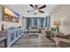Cozy living room with comfortable seating, a modern entertainment center, and natural light at 1321 S Ocean Blvd. # 510, North Myrtle Beach, SC 29582