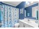 Bathroom with a single vanity, toilet and fish themed shower curtain at 138 Wofford Rd., Conway, SC 29526
