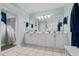 Bathroom with a double vanity and a large mirror at 138 Wofford Rd., Conway, SC 29526