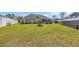 Expansive back yard featuring lush green grass and privacy fence at 171 Talon Dr., Conway, SC 29527