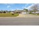 Welcoming home exterior showcasing a well-manicured lawn and wide driveway at 171 Talon Dr., Conway, SC 29527