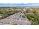 Aerial view highlighting community with a pond, landscaping, and nearby waterway access at 174 Sea Shell Dr. # 19, Murrells Inlet, SC 29576
