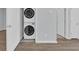 Convenient laundry room with a stacked washer and dryer, plus easy access to additional areas at 174 Sea Shell Dr. # 19, Murrells Inlet, SC 29576