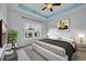 Serene bedroom with a large window, plush bedding, and stylish decor, creating a relaxing retreat at 174 Sea Shell Dr. # 19, Murrells Inlet, SC 29576