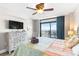 Bright bedroom with a view, coastal decor, and comfortable bedding at 201 74Th Ave. N # 1802, Myrtle Beach, SC 29572