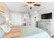 Cozy bedroom showcasing coastal accents and a surfboard decoration at 201 74Th Ave. N # 1802, Myrtle Beach, SC 29572