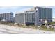 Beachfront resort featuring multiple floors, balconies, and beautiful views of the ocean and beach at 201 74Th Ave. N # 1802, Myrtle Beach, SC 29572