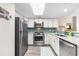 Beautiful kitchen featuring stainless steel appliances, granite counters, and stylish backsplash at 201 74Th Ave. N # 1802, Myrtle Beach, SC 29572