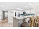 Open kitchen featuring granite countertops, modern cabinets, stainless appliances and breakfast bar at 201 74Th Ave. N # 1802, Myrtle Beach, SC 29572