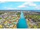 Aerial view of community next to waterway with a pool, lush landscaping, and close proximity to the ocean at 2180 Waterview Dr. # 513, North Myrtle Beach, SC 29582