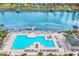 Aerial view of a community pool with a clear view of the harbor and houses at 2180 Waterview Dr. # 513, North Myrtle Beach, SC 29582