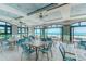 Bright dining room with stunning ocean views, ample seating, and ceiling fans for added comfort at 2180 Waterview Dr. # 513, North Myrtle Beach, SC 29582