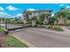 Exterior view of a gated community with lush landscaping and multi-story building at 2180 Waterview Dr. # 513, North Myrtle Beach, SC 29582