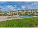 Enjoy the beautiful community pool with a covered pavilion, lush landscaping and views of the condos at 2180 Waterview Dr. # 513, North Myrtle Beach, SC 29582
