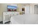 Bedroom with ocean view, a full dresser, and easy access to a full kitchen at 2301 S Ocean Blvd. # 1023, Myrtle Beach, SC 29577