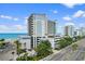A multi-story building has an attached parking garage with ocean views from its resort rooms at 2301 S Ocean Blvd. # 1023, Myrtle Beach, SC 29577