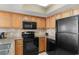 Kitchen with stainless steel appliances, granite countertops and light wood cabinetry at 2301 S Ocean Blvd. # 1023, Myrtle Beach, SC 29577