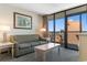 Relax in the living room and enjoy balcony access with abundant light and fresh air at 2301 S Ocean Blvd. # 1023, Myrtle Beach, SC 29577