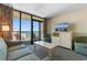 Bright living room with ocean views, balcony access, and comfortable seating arrangement at 2301 S Ocean Blvd. # 1023, Myrtle Beach, SC 29577