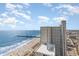 High-rise condo with beach and ocean views, near coastal construction and city street, under partly cloudy skies at 2600 N Ocean Blvd. # 1914, Myrtle Beach, SC 29577