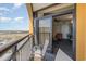 Balcony overlooking the city skyline includes outdoor seating and opens to the living room at 2600 N Ocean Blvd. # 1914, Myrtle Beach, SC 29577