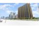 Wide angle shot of a beach with a luxury condominium building in the background on a bright sunny day at 2600 N Ocean Blvd. # 1914, Myrtle Beach, SC 29577