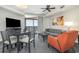 Living area with an ocean-view balcony and a ceiling fan above at 2600 N Ocean Blvd. # 1914, Myrtle Beach, SC 29577