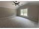 Inviting bedroom with a window and a vaulted ceiling, offering a cozy and well-lit space at 2921 Hughes Gasque Rd., Aynor, SC 29511