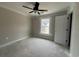 Unfinished bedroom featuring a ceiling fan and natural light from the window at 2921 Hughes Gasque Rd., Aynor, SC 29511