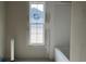 Unfinished bathroom with a single window and bathtub on the right at 2925 Hughes Gasque Rd., Aynor, SC 29511