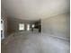 Spacious living room with large windows and neutral walls, providing a blank canvas for personalization at 2925 Hughes Gasque Rd., Aynor, SC 29511