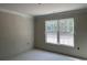 Bright bedroom featuring fresh paint, window and outdoor views at 2929 Hughes Gasque Rd., Aynor, SC 29511