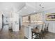 Bright kitchen featuring granite countertops, stainless steel appliances, pendant lighting, and wood flooring at 296 West Palms Dr., Myrtle Beach, SC 29579