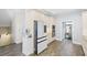Kitchen featuring stainless steel appliances, marble counters, and modern white cabinetry at 296 West Palms Dr., Myrtle Beach, SC 29579