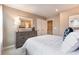Comfortable bedroom with dresser, side table, and a large mirror at 300 Golan Circle # A, Myrtle Beach, SC 29579