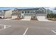 New townhomes with stone accents, garages, and well-manicured landscaping at 300 Golan Circle # A, Myrtle Beach, SC 29579