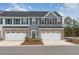 Beautiful two-story townhome with a one car garage and charming curb appeal at 300 Golan Circle # A, Myrtle Beach, SC 29579