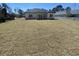 Expansive backyard offers a serene setting for outdoor enjoyment and relaxation at 311 St. Andrews Ln., Myrtle Beach, SC 29588