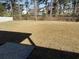 Spacious backyard with mature trees, offering a serene and private setting at 311 St. Andrews Ln., Myrtle Beach, SC 29588