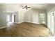 Bright, open-concept living room with wood floors and lots of natural light at 311 St. Andrews Ln., Myrtle Beach, SC 29588